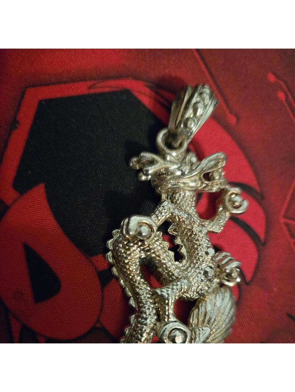 Plated silver dragon pendant
